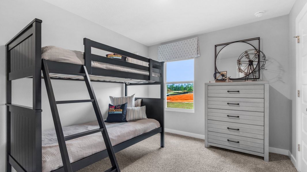 Representative furnished interior of a home built from the Delilah by D.R. Horton in Colonial East, Panama City Beach (Image 28).
