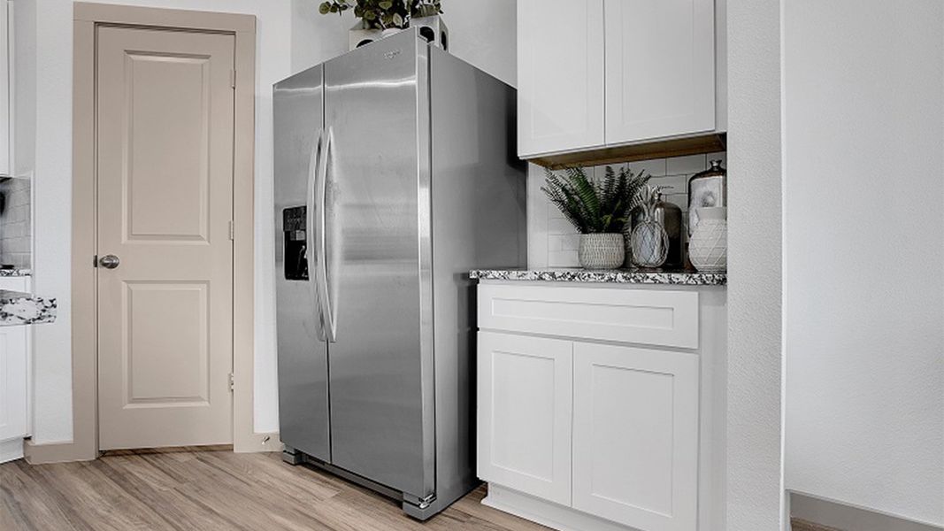 Representative furnished interior of a home built from the The Texas Cali by D.R. Horton in Abbey Glen, Lubbock (Image 7).