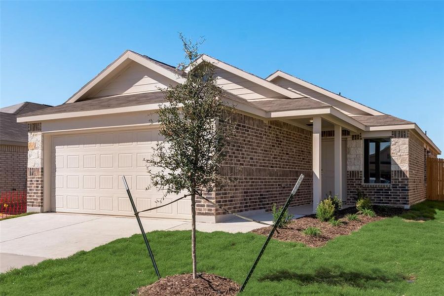 Ranch-style house with a front yard and a garage