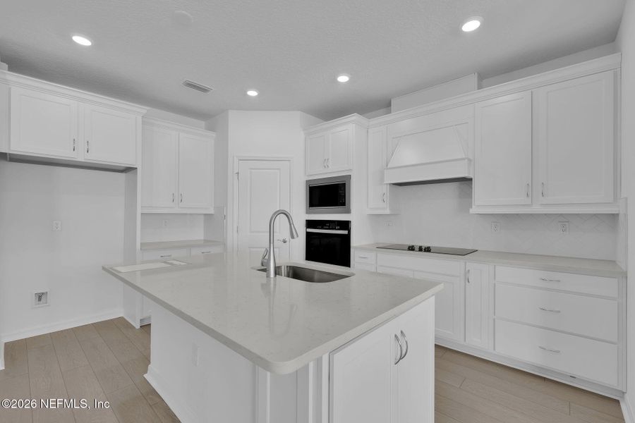Furnished interior view inside a new home in Hyland Trail, Green Cove Springs (Image 6).