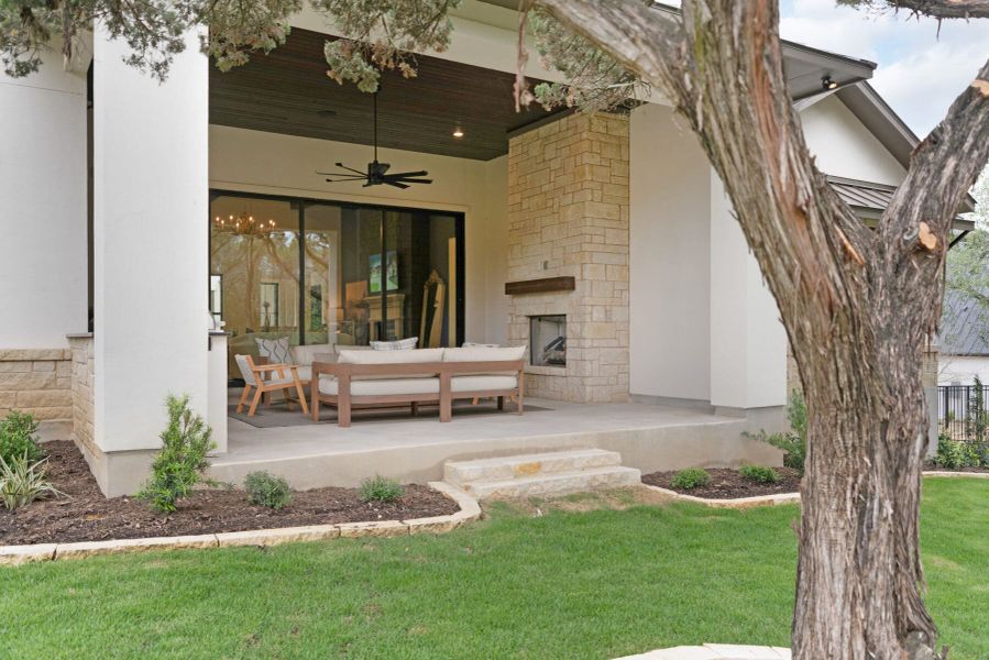 Exterior details and patio area of a home in Enchanted Bluff, Garden Ridge (Image 30).