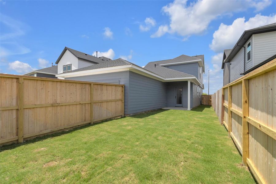Exterior details and patio area of a home in Elyson, Katy (Image 28).