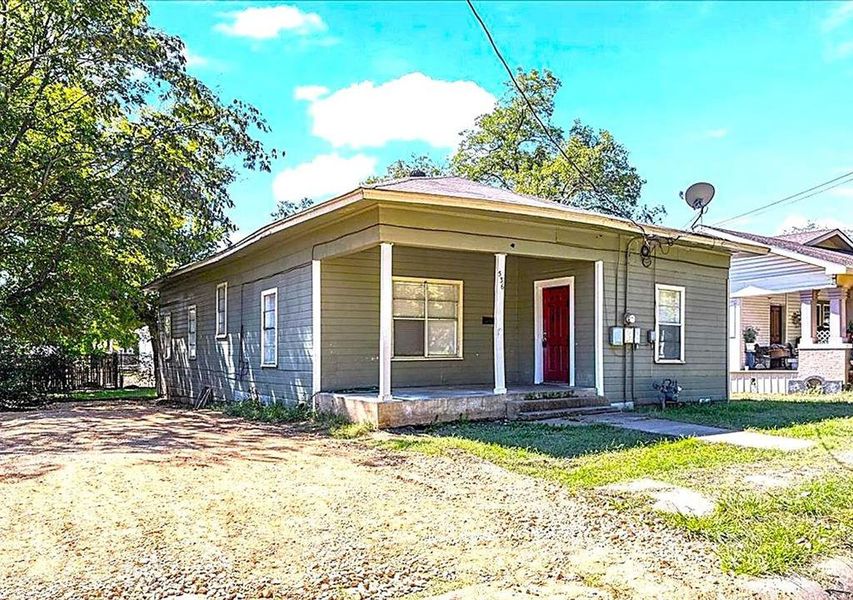 View of front of property featuring covered porch