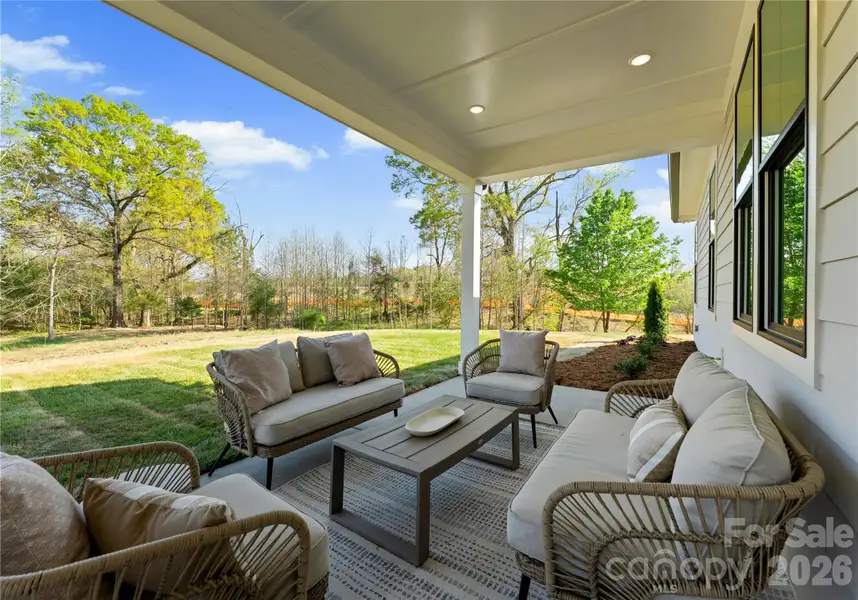 Exterior details and patio area of a home in , Locust (Image 26).