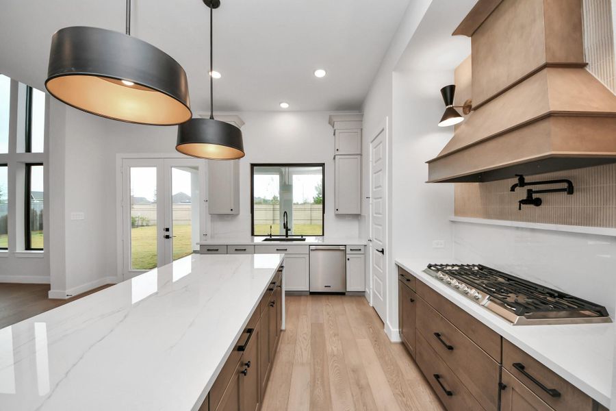 Enjoy the wood accents in this home as the meet modern finishes.