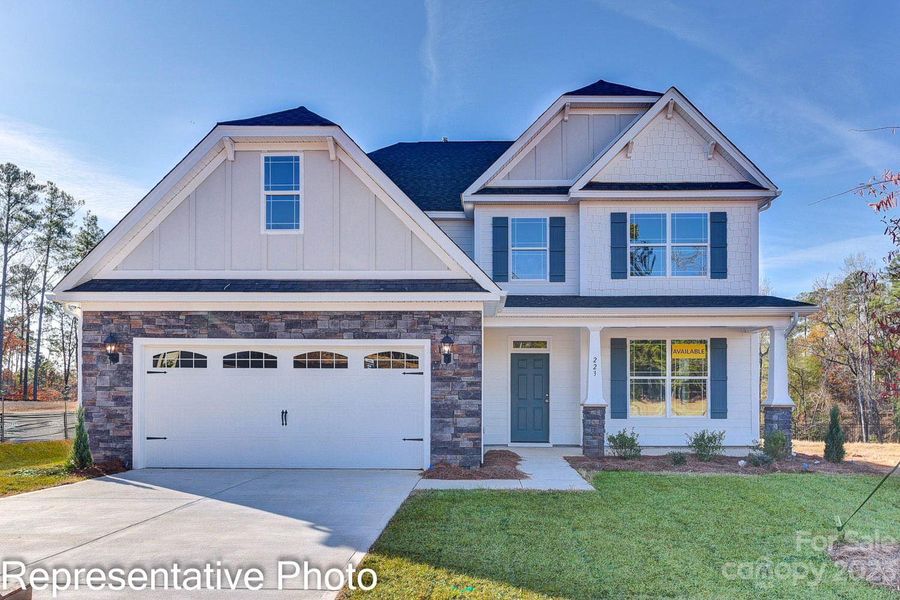 Homesite 605 features a McDowell floorplan with front-laod garage.