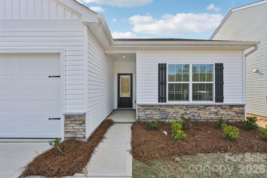 Exterior details and patio area of a home in Willow Estates, Shelby (Image 3).