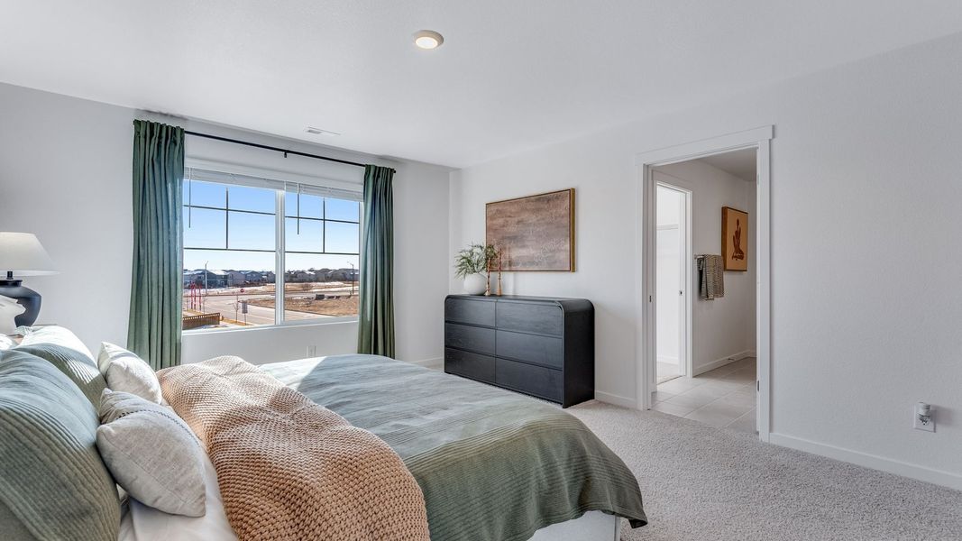 Furnished interior view inside a new home in The Ridge at Lorson Ranch, Colorado Springs (Image 13).