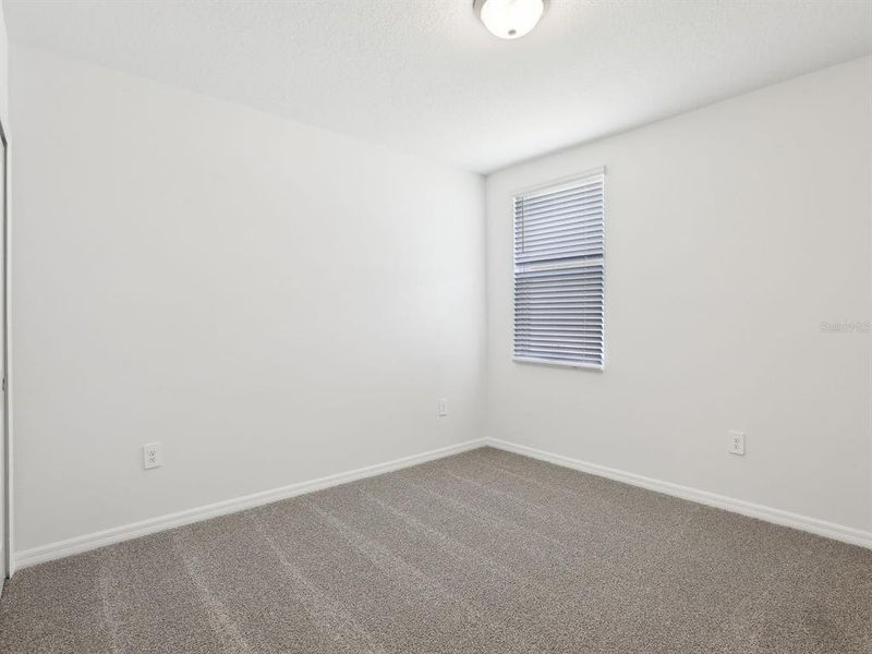 Spacious, unfurnished interior of a new home in The Reserve at Van Oaks, Auburndale (Image 17).