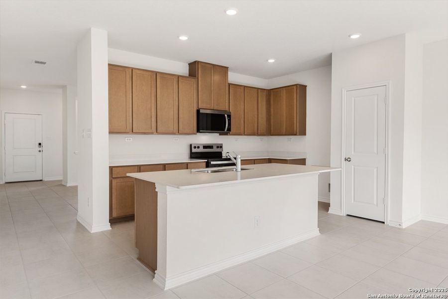 Furnished interior view inside a new home in Hidden Bluffs at TRP, San Antonio (Image 6).