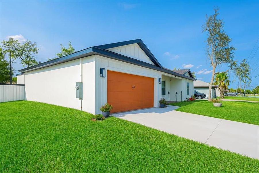 Front exterior of a new home in , Deltona, FL, highlighting curb appeal (Image 21).