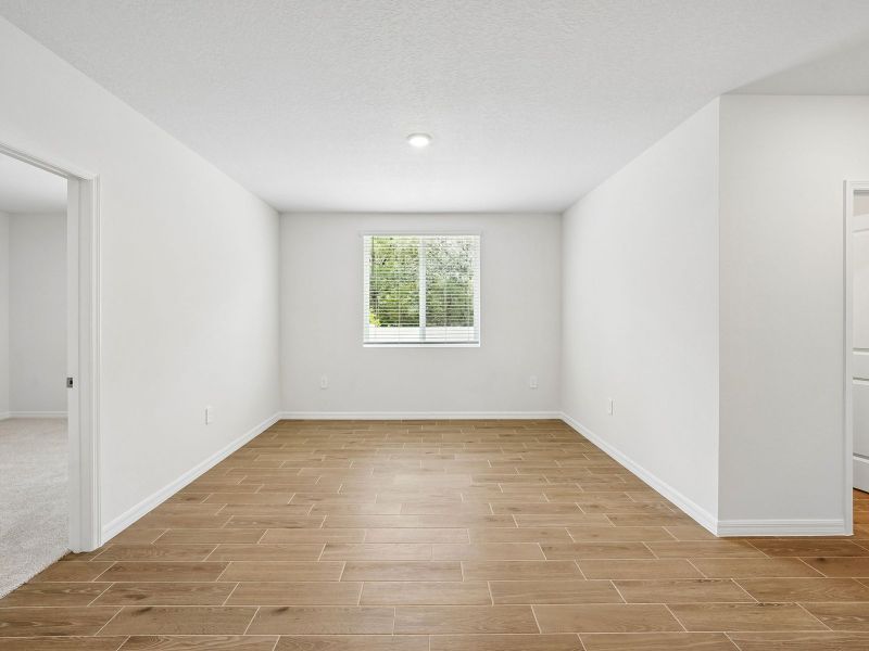 Spacious, unfurnished interior of a new home in The Grove at Stuart Crossing - Classic Series, Bartow (Image 14). Spacious, unfurnished interior of a new home in The Grove at Stuart Crossing - Classic Series, Bartow (Image 14).