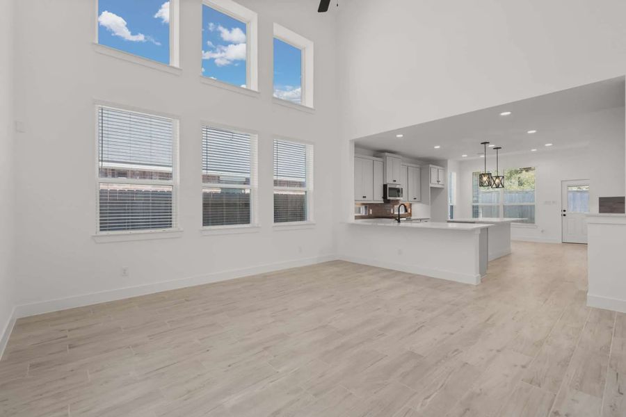 Representative unfurnished interior of a home built from the Dublin by Chesmar Homes in Sunterra, Katy (Image 4). Representative unfurnished interior of a home built from the Dublin by Chesmar Homes in Sunterra, Katy (Image 4).