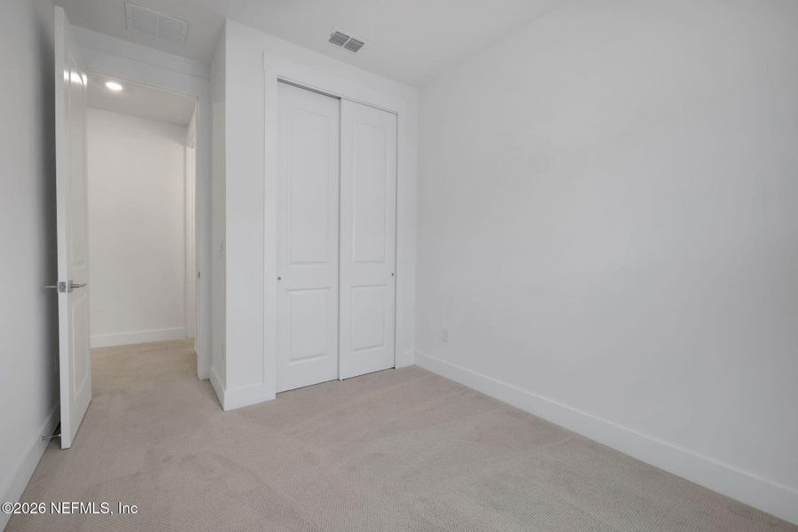 Spacious, unfurnished interior of a new home in North Beach Townhomes, Jacksonville Beach (Image 21).