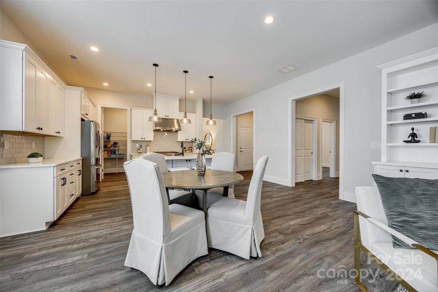 Nice dining area!  Plenty of space for a larger dining table, or keep it intimate.