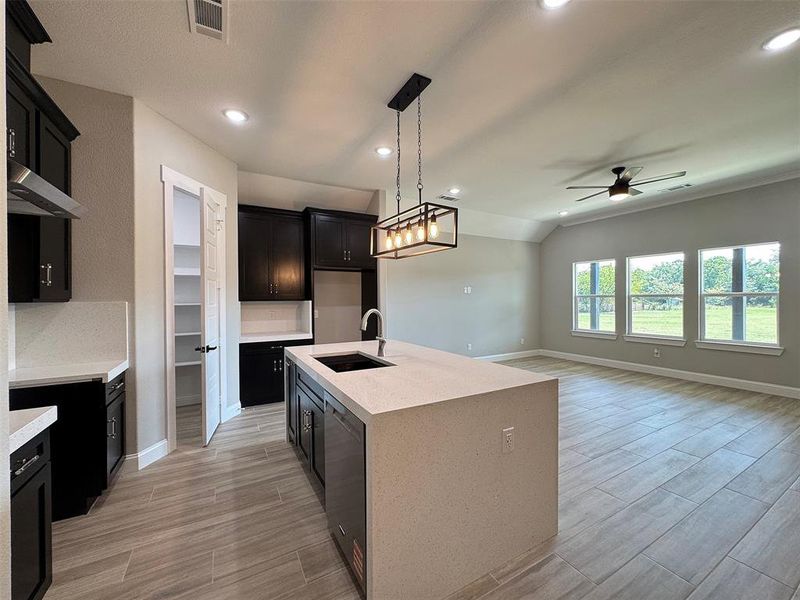 Open-concept living space with a central kitchen island