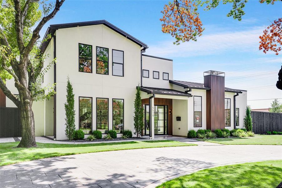 Front exterior of a new home in , Dallas, TX, highlighting curb appeal (Image 21).