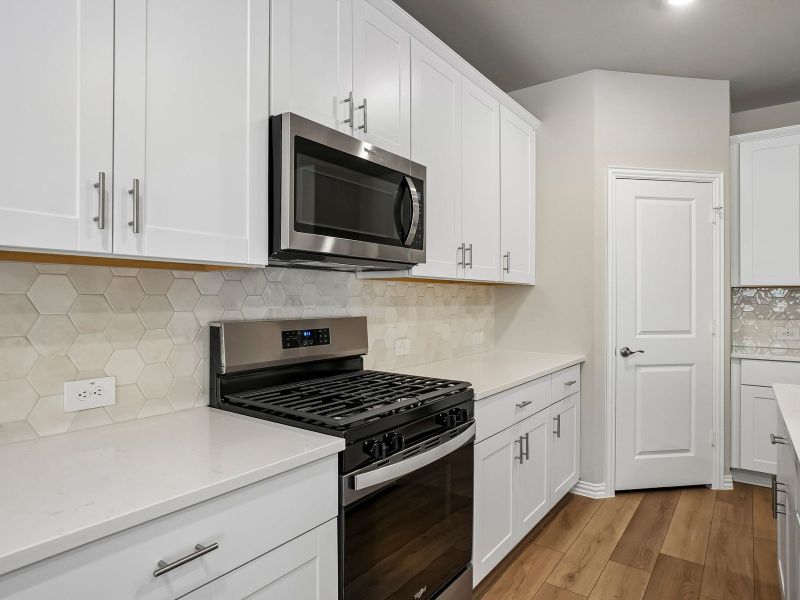Furnished interior view inside a new home in Parks at Foster Crossing - Premier Series, Anna (Image 10).