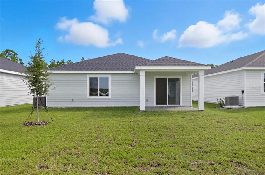 Exterior details and patio area of a home in , Palm Coast (Image 3). Exterior details and patio area of a home in , Palm Coast (Image 3).