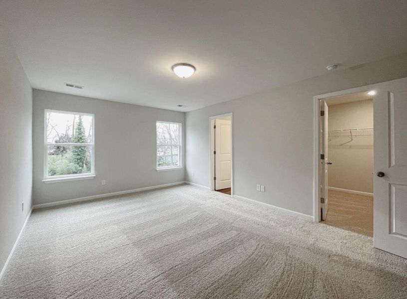 Spacious, unfurnished interior of a new home in East Main Townes, Spartanburg (Image 21).