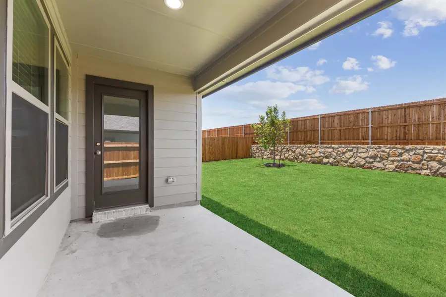 Covered Patio in the Quartz home plan by Trophy Signature Homes – REPRESENTATIVE PHOTO