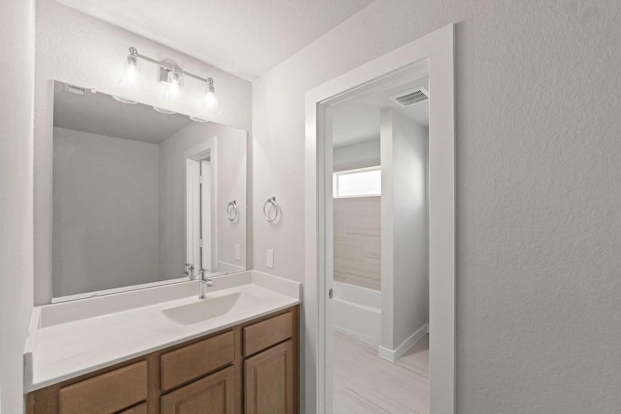 Furnished interior view inside a new home in Briarwood Crossing, Rosenberg (Image 12).