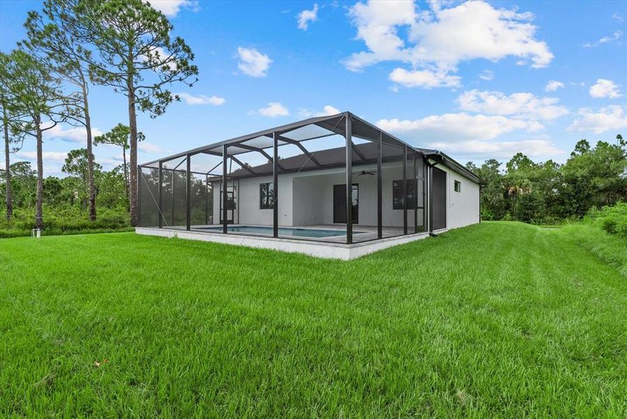 Front exterior of a new home in , Port Charlotte, FL, highlighting curb appeal (Image 25). Front exterior of a new home in , Port Charlotte, FL, highlighting curb appeal (Image 25).