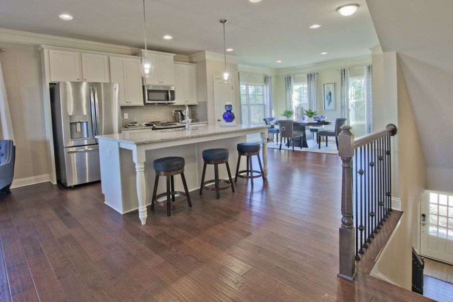 Representative furnished interior of a home built from the Barwick by KM Homes in Nickel Creek at Newnan Crossing, Newnan (Image 9).