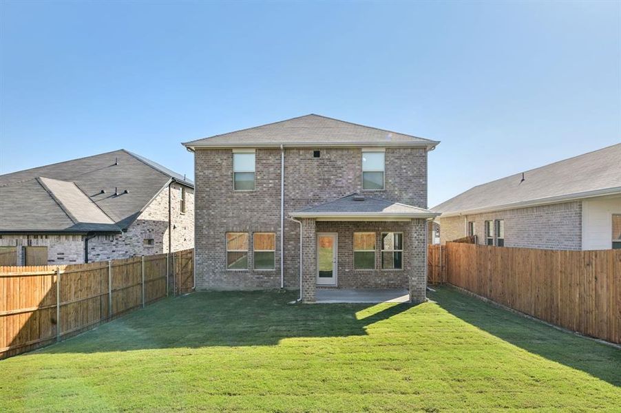 Exterior details and patio area of a home in Simpson Crossing - Spring Series, McKinney (Image 4).