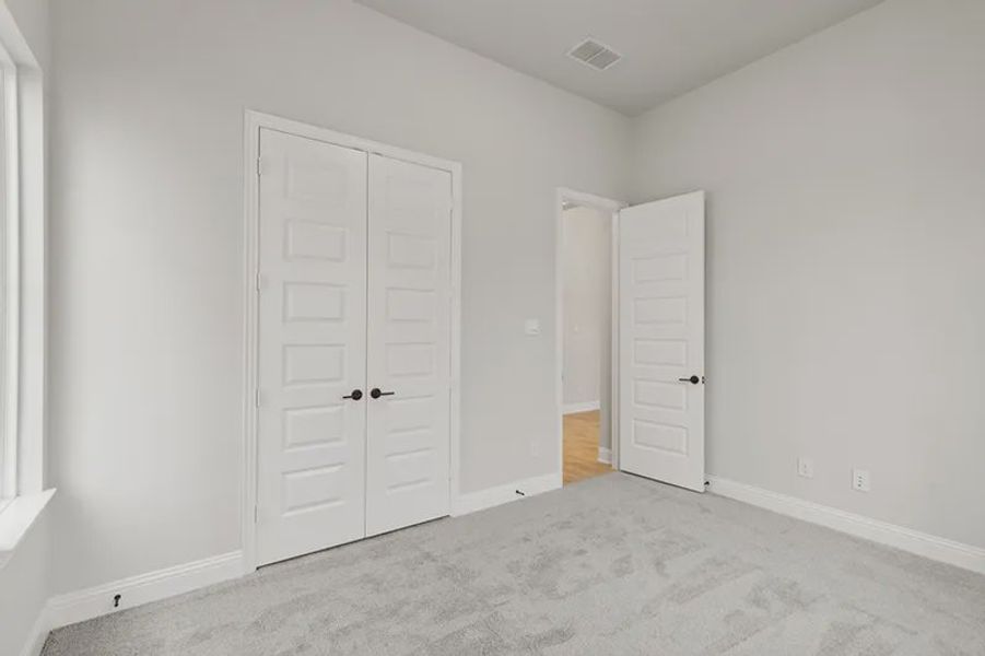 Representative unfurnished interior of a home built from the Logan by Cambridge Homes in Lake Park, Rowlett (Image 25).