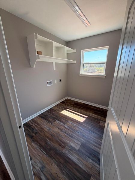 Utility Room with washer and dryer hook ups (electric).