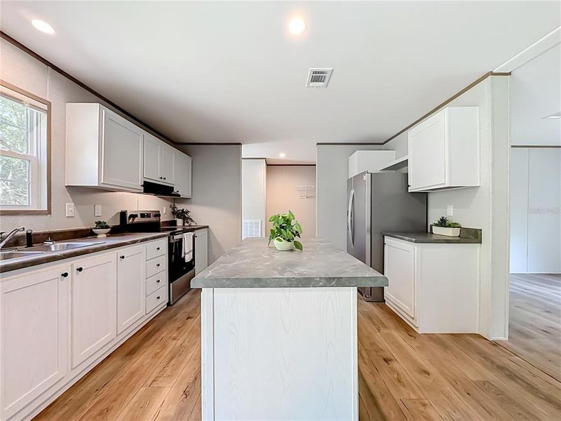 Furnished interior view inside a new home in , Satsuma (Image 12).