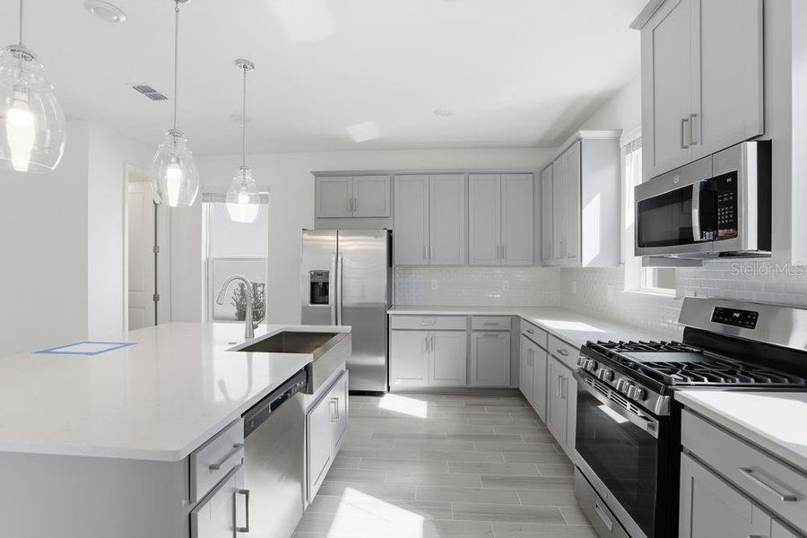 Furnished interior view inside a new home in Harvest at Ovation, Winter Garden (Image 5).