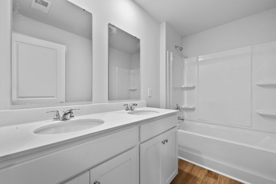 Furnished interior view inside a new home in The Cove at Mallard Crossing, Summerville (Image 9). Furnished interior view inside a new home in The Cove at Mallard Crossing, Summerville (Image 9).