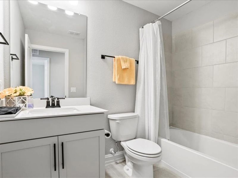 Upstairs full bathroom. Upstairs full bathroom.