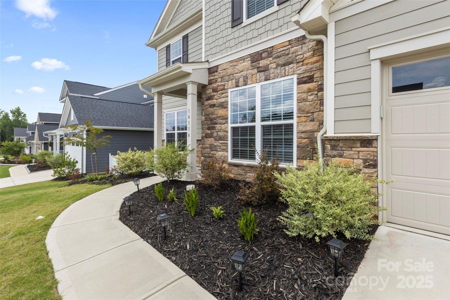 Front exterior of a new home in , Charlotte, NC, highlighting curb appeal (Image 25).