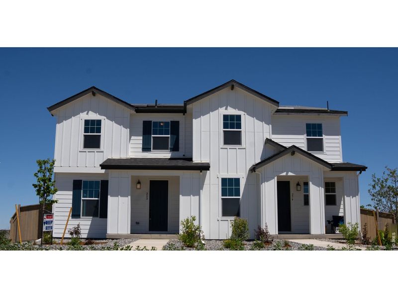 Front exterior of a new home in , Erie, CO, highlighting curb appeal (Image 2). Front exterior of a new home in , Erie, CO, highlighting curb appeal (Image 2).