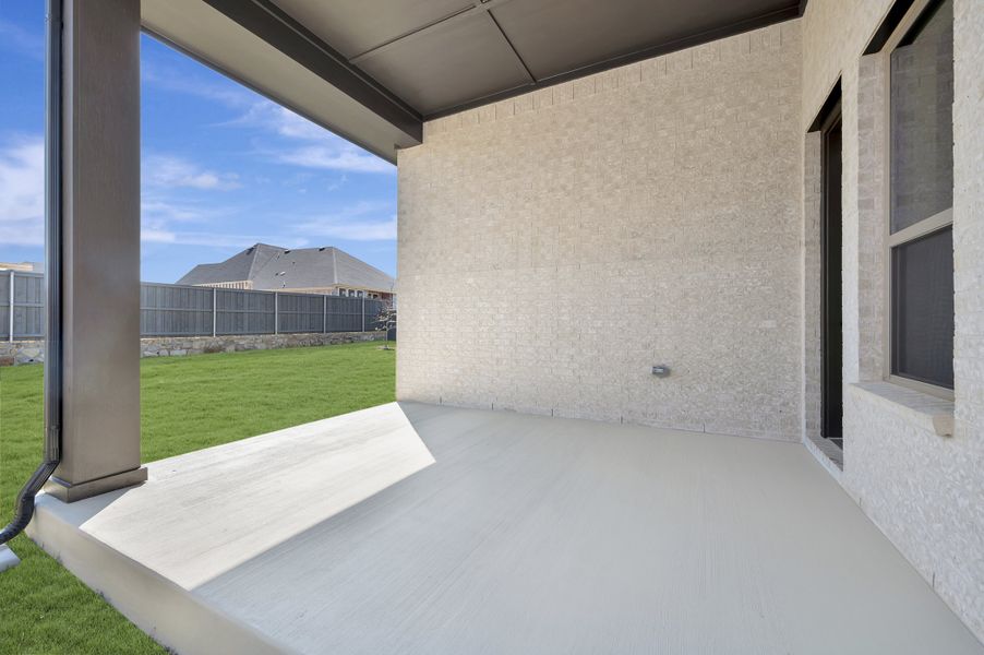 Exterior details and patio area of a home in Goodland – Manor Series, Grand Prairie (Image 3).