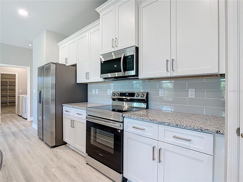 Furnished interior view inside a new home in , North Port (Image 9).