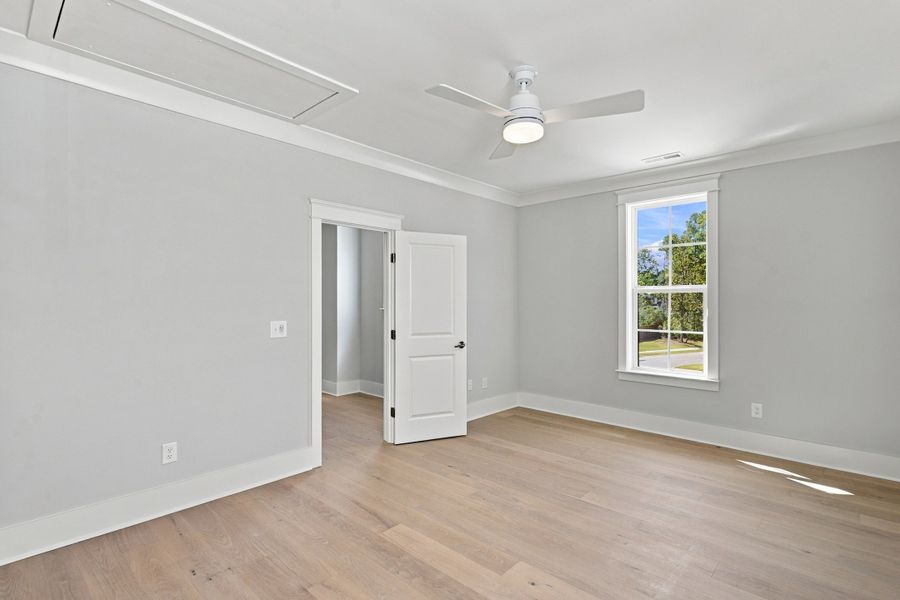 Representative unfurnished interior of a home built from the The Emerson by RobuckHomes in Stonehenge, Raleigh (Image 223).