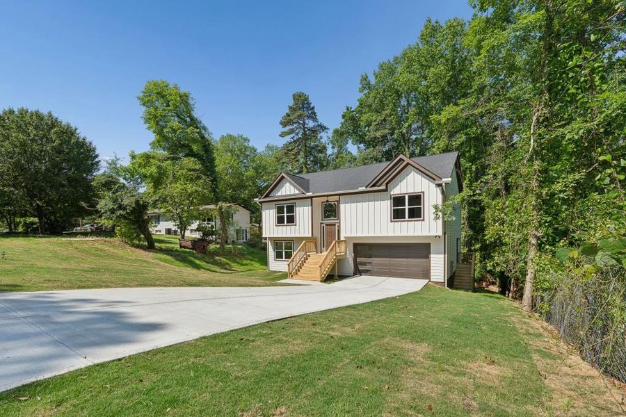 Front exterior of a new home in , Gainesville, GA, highlighting curb appeal (Image 21).