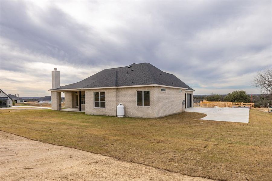 Exterior details and patio area of a home in Vintage Oaks, Weatherford (Image 4). Exterior details and patio area of a home in Vintage Oaks, Weatherford (Image 4).