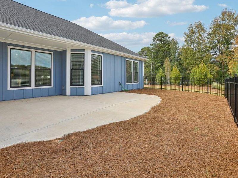 Exterior details and patio area of a home in , Holly Springs (Image 29).