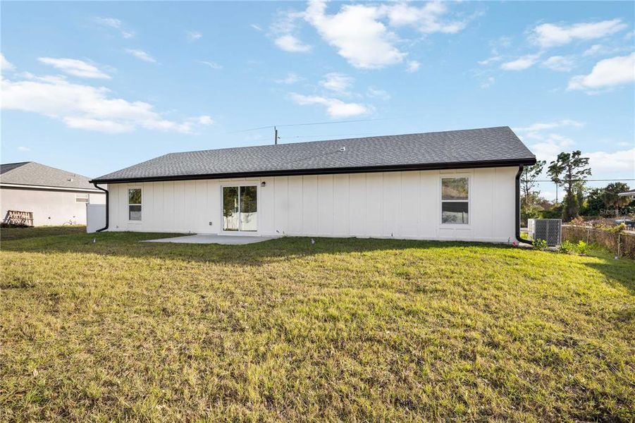 Exterior details and patio area of a home in , North Port (Image 22).