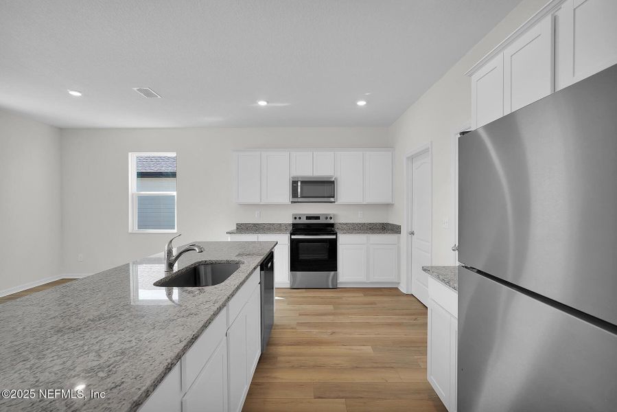 Furnished interior view inside a new home in Westport Landing, Jacksonville (Image 10).