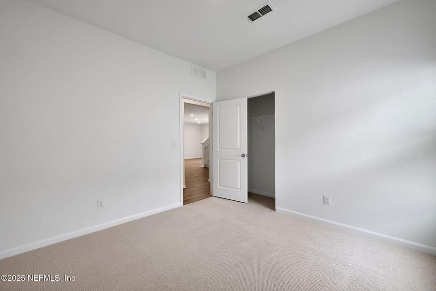 Spacious, unfurnished interior of a new home in Cordova Palms, St. Augustine (Image 25).