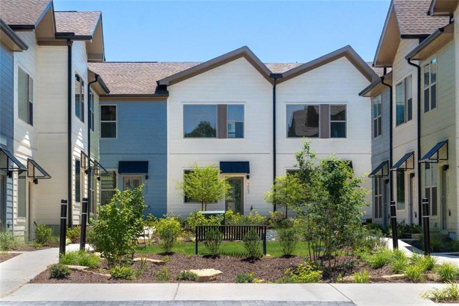 Front exterior of a new home in , Atlanta, GA, highlighting curb appeal (Image 16).