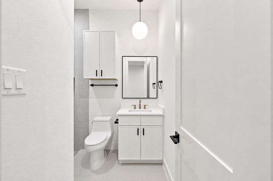 Vanity for bathroom on the first floor.