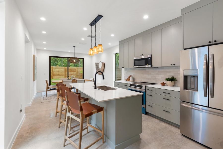A generous kitchen layout supports both everyday meals and special occasions. A generous kitchen layout supports both everyday meals and special occasions.