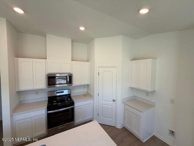 Furnished interior view inside a new home in Grand Reserve, Bunnell (Image 6).
